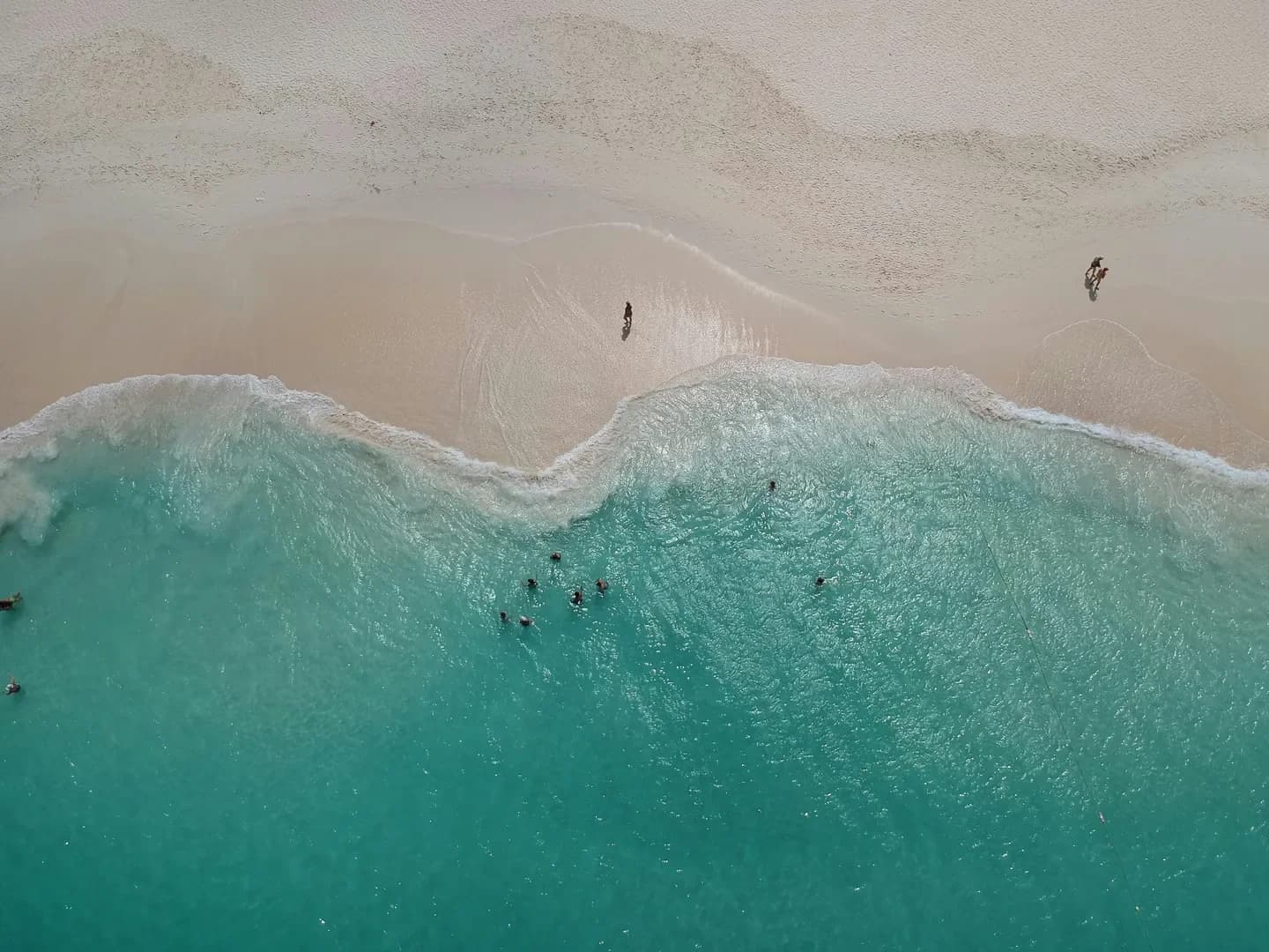 Aerial view of pristine beach and turquoise waters